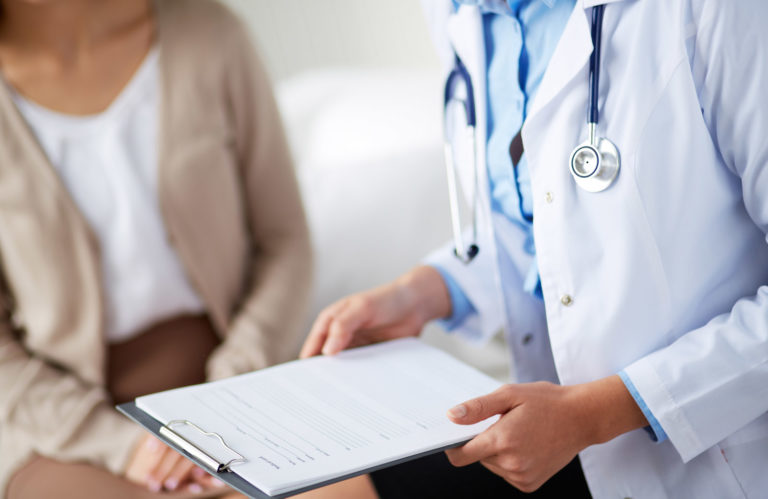 Doctor talking to clinical trials participant